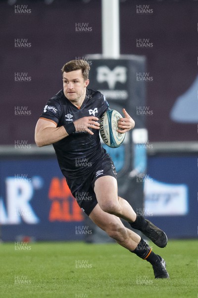 040323 - Ospreys v Benetton - United Rugby Championship - Michael Collins of Ospreys runs at the defence
