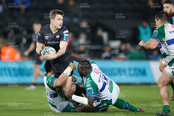 040323 - Ospreys v Benetton - United Rugby Championship - Michael Collins of Ospreys is tackled