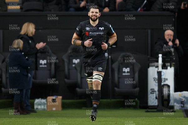 040323 - Ospreys v Benetton - United Rugby Championship - Rhys Davies of Ospreys runs out onto the pitch on his 50th appearance