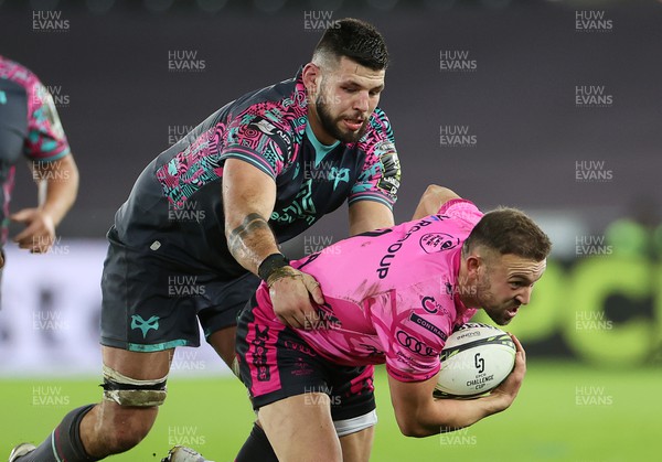 091223 - Ospreys v Benetton - European Challenge Cup - Andy Uren of Benetton is tackled by Rhys Davies of Ospreys 