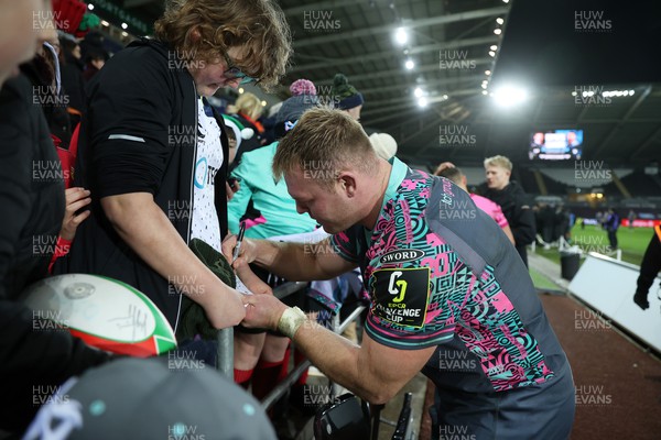 091223 - Ospreys v Benetton - European Challenge Cup - Dewi Lake of Ospreys signs autographs