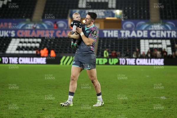 091223 - Ospreys v Benetton - European Challenge Cup - Owen Watkin of Ospreys at full time with his child