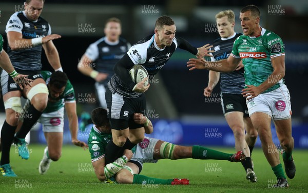 220918 - Ospreys v Benetton Rugby - Guinness PRO14 - George North of Ospreys is tackled by Sebastian Negri of Benetton