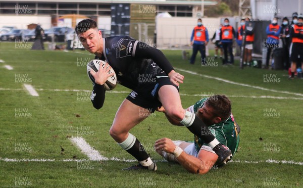 221120 - Ospreys v Benetton Rugby, Guinness PRO14 - Reuben Morgan-Williams of Ospreys is caught by Irne Herbst of Benetton