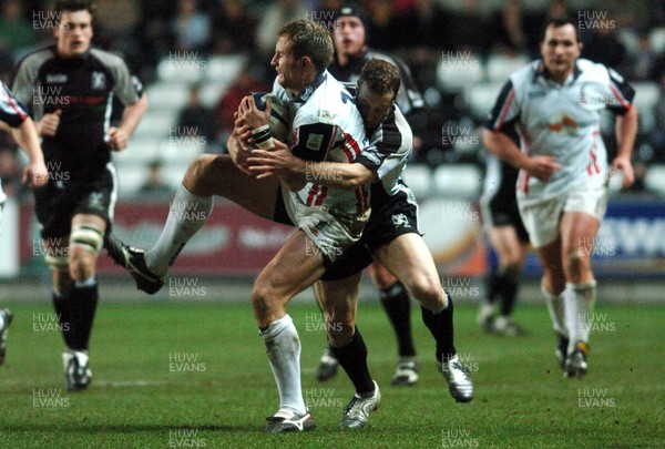 031205 - Celtic League Rugby Ospreys v Borders Borders' Stuart Moffat is caught by Stefan Terblanche 