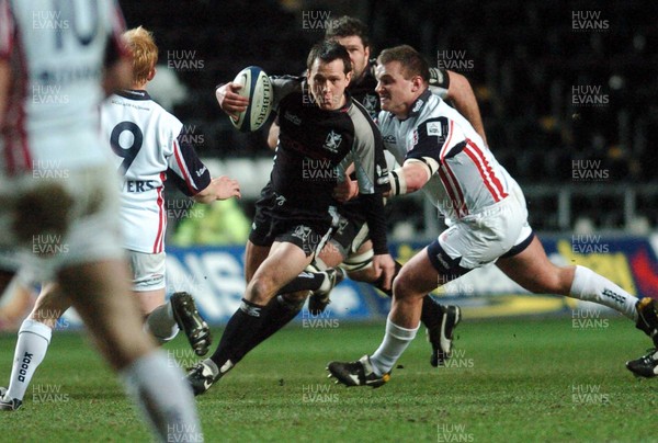 031205 - Celtic League Rugby Ospreys v Borders Ospreys' Shaun Connor tries to find a way through 