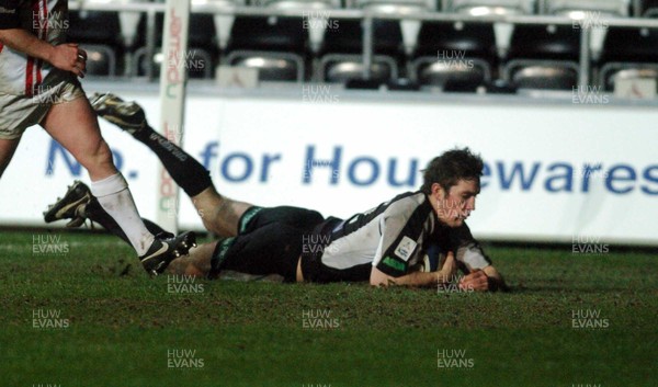 031205 - Celtic League Rugby Ospreys v Borders Ospreys' Andrew Bishop claims a try 