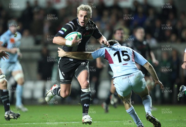 10.11.07..Ospreys v Bourgoin, Heineken Cup Ospreys' Justin Marshall takes on Bourgoin's Anthony Forest 