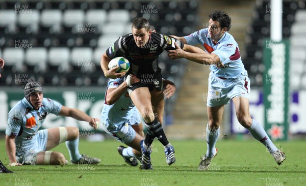 10.11.07..Ospreys v Bourgoin, Heineken Cup Ospreys' Lee Byrne tries to break away from the Bourgoin defence 