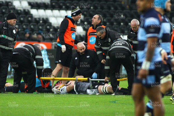 050119 - Ospreys v Cardiff Blues - GuinnessPro14 - Adam Beard of Ospreys is treated for injury before leaving the field
