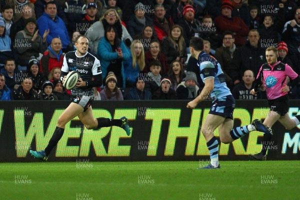 050119 - Ospreys v Cardiff Blues - GuinnessPro14 - Cory Allen of Ospreys takes on Tomos Williams of Cardiff Blues