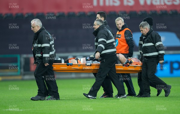 050119 - Ospreys v Cardiff Blues, Guinness PRO14 - Adam Beard of Ospreys is stretchered  from the pitch after injury