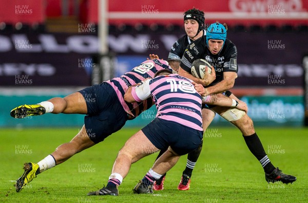 060119 - Ospreys v Cardiff Blues, Guinness PRO14 - Justin Tipuric of Ospreys is tackled by Dillon Lewis and Nick Williams of Cardiff Blues 