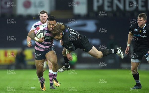 060118 - Ospreys v Cardiff Blues - Guinness PRO14 - Willis Halaholo of Cardiff Blues is tackled by Jeff Hassler of Ospreys