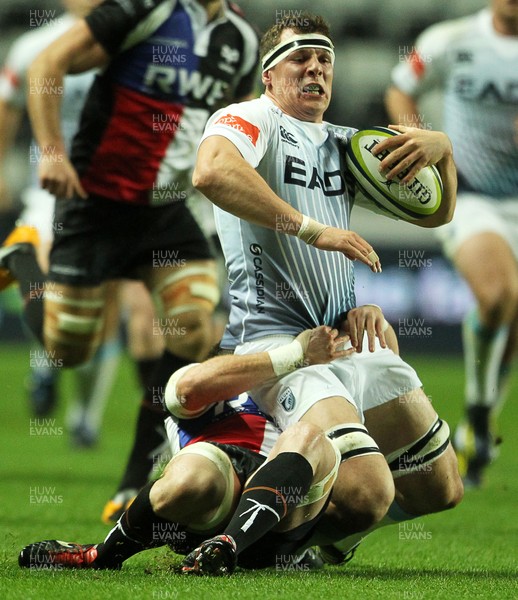 151113 - Ospreys v Cardiff Blues - LV= Cup - Robin Copeland of Cardiff Blues is tackled by Matthew Morgan of Ospreys