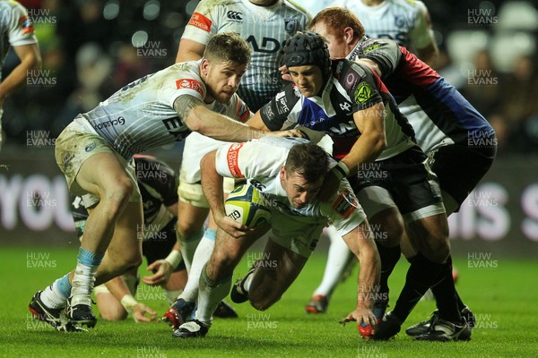 151113 - Ospreys v Cardiff Blues - LV= Cup - Dafydd Hewitt of Cardiff Blues makes his way through the Ospreys defence