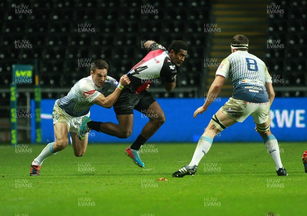 151113 Ospreys v Cardiff Blues - LV=Cup -Ospreys' Aiesa Nataoga is tackled by Blues' Chris Czekaj