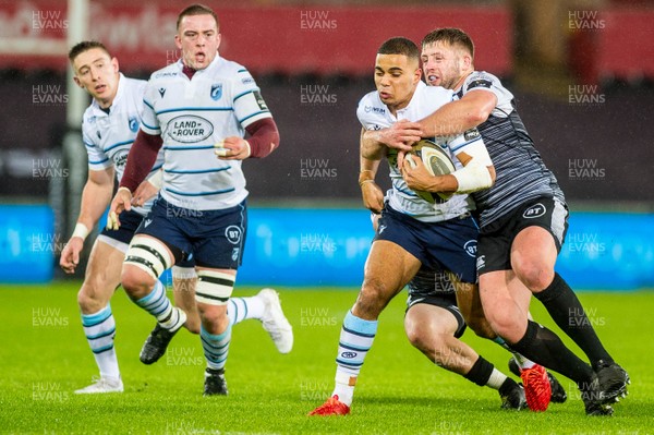 211219 - Ospreys v Cardiff Blues - Guinness PRO14 - Ben Thomas of Cardiff Blues in tackled 