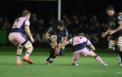 010126 - Ospreys v Cardiff Rugby, United Rugby Championship - Tom Botha of Ospreys takes on Dan Thomas of Cardiff Rugby and Josh McNally of Cardiff Rugby