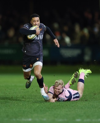 010126 - Ospreys v Cardiff Rugby, United Rugby Championship - Keelan Giles of Ospreys beats Johan Mulder of Cardiff Rugby and races in to score try