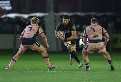 010126 - Ospreys v Cardiff Rugby, United Rugby Championship - Rhys Davies of Ospreys takes on Dan Thomas of Cardiff Rugby and Danny Southworth of Cardiff Rugby
