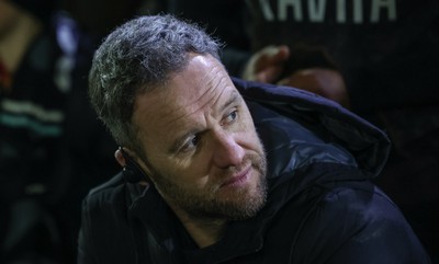 010126 - Ospreys v Cardiff Rugby, United Rugby Championship - Ospreys head coach Mark Jones speaks to the players at the end of the match