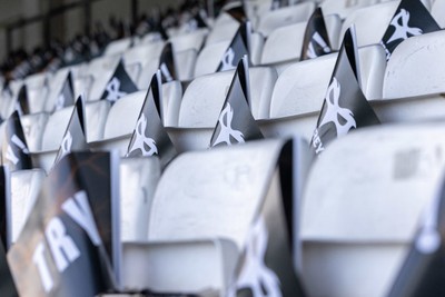 010126 - Ospreys v Cardiff Rugby - United Rugby Championship - Flags on supporters seats prior to kick off