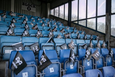 010126 - Ospreys v Cardiff Rugby - United Rugby Championship - Flags on supporters seats prior to kick off