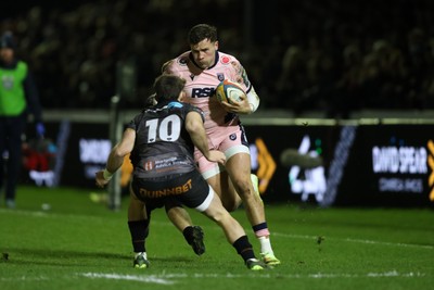 010126 - Ospreys v Cardiff Rugby - United Rugby Championship - Mason Grady of Cardiff Rugby attacks Dan Edwards of Ospreys