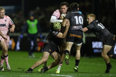 010126 - Ospreys v Cardiff Rugby - United Rugby Championship - Harri Deaves of Ospreys stops Mason Grady of Cardiff Rugby