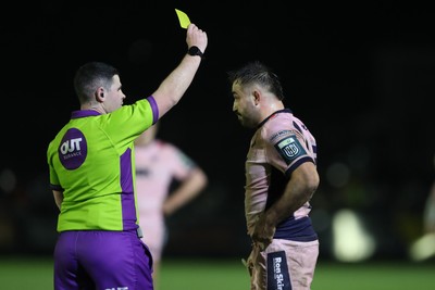 010126 - Ospreys v Cardiff Rugby - United Rugby Championship - Referee Adam Jones shows Liam Belcher of Cardiff Rugby a yellow card