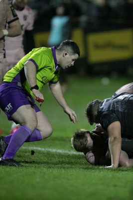 010126 - Ospreys v Cardiff Rugby - United Rugby Championship - Referee Adam Jones has a close view of Sam Parry of Ospreys try