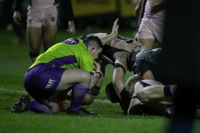 010126 - Ospreys v Cardiff Rugby - United Rugby Championship - Referee Adam Jones has a close view of Sam Parry of Ospreys try