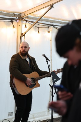 010126 - Ospreys v Cardiff Rugby - United Rugby Championship - Musician in the marquee