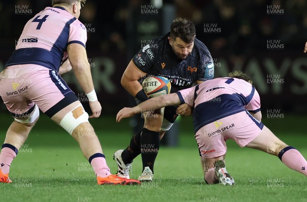 010126 - Ospreys v Cardiff Rugby, United Rugby Championship - Tom Botha of Ospreys takes on Dan Thomas of Cardiff Rugby and Josh McNally of Cardiff Rugby