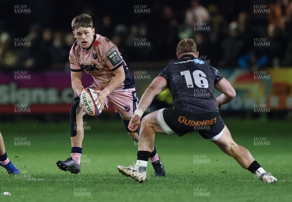 010126 - Ospreys v Cardiff Rugby, United Rugby Championship - Alex Mann of Cardiff Rugby takes on Dewi Lake of Ospreys