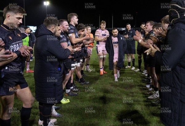 010126 - Ospreys v Cardiff Rugby, United Rugby Championship - Liam Belcher of Cardiff Rugby leads his players off at the end of the match