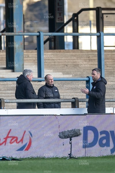 010126 - Ospreys v Cardiff Rugby - United Rugby Championship - Ospreys CEO Lance Bradley chats with Ospreys Head Coach Mark Jones before kick off
