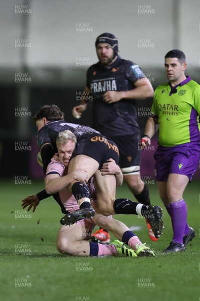 010126 - Ospreys v Cardiff Rugby - United Rugby Championship - Johan Mulder of Cardiff Rugby tackles Jack Walsh of Ospreys