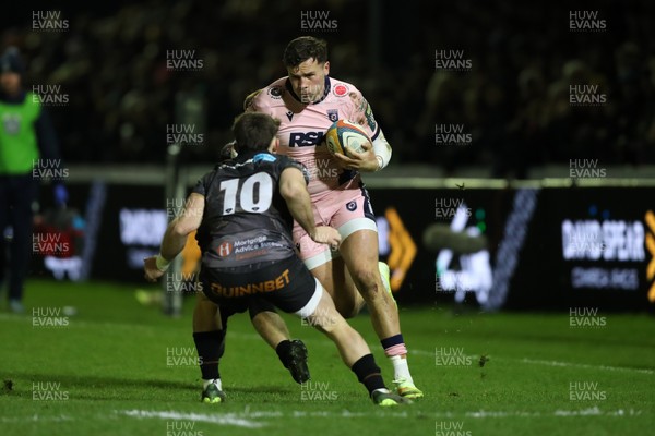 010126 - Ospreys v Cardiff Rugby - United Rugby Championship - Mason Grady of Cardiff Rugby attacks Dan Edwards of Ospreys