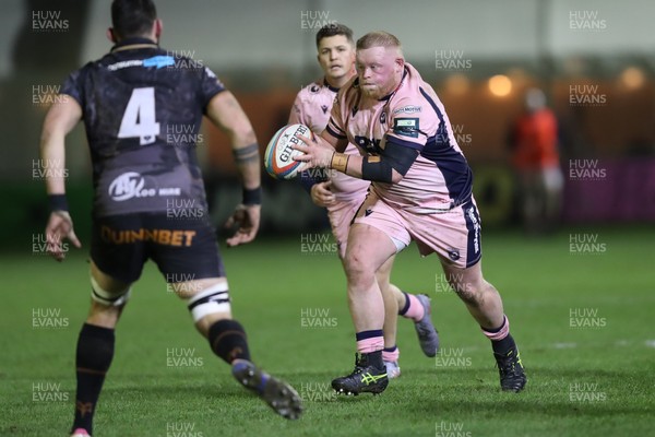 010126 - Ospreys v Cardiff Rugby - United Rugby Championship - Kieron Assiratti of Cardiff Rugby runs at Rhys Davies of Ospreys