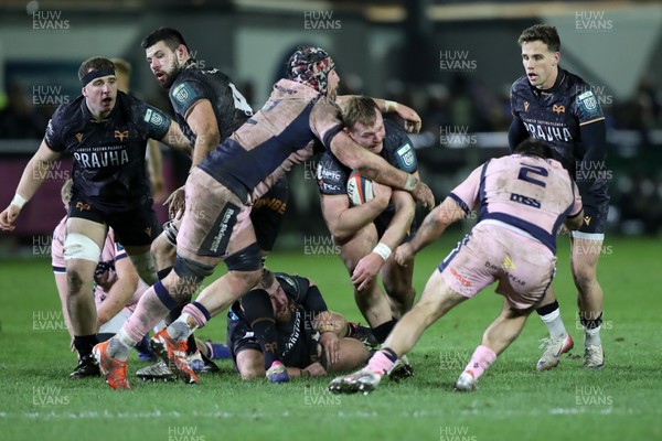 010126 - Ospreys v Cardiff Rugby - United Rugby Championship - Dewi Lake of Ospreys is stopped by Alun Lawrence of Cardiff Rugby