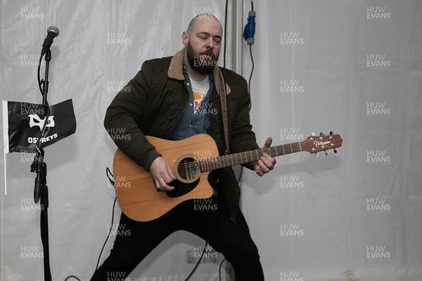010126 - Ospreys v Cardiff Rugby - United Rugby Championship - Musician in the marquee