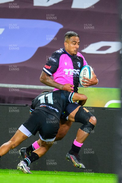 061023 - Ospreys v Cardiff Rugby - Preseason Friendly - Rey Lee-Lo of Cardiff Rugby is tackled by Keelan Giles  of Ospreys