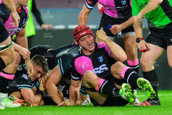 061023 - Ospreys v Cardiff Rugby - Preseason Friendly - James Botham of Cardiff Rugby celebrates scoring a try