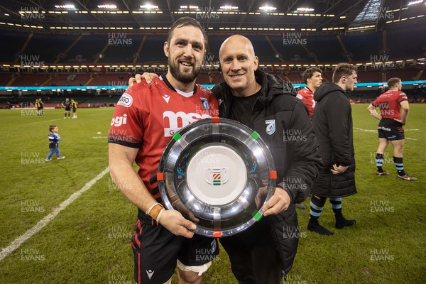 220423 - Ospreys v Cardiff Rugby - United Rugby Championship - Judgement Day - Josh Turnbull of Cardiff and Richard Hodges with the Welsh Shield