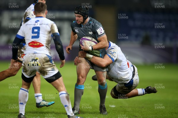 121220 - Ospreys v Castres Olympique - European Challenge Cup - Dan Evans of Ospreys is tackled by Maama Vaipulu of Castres
