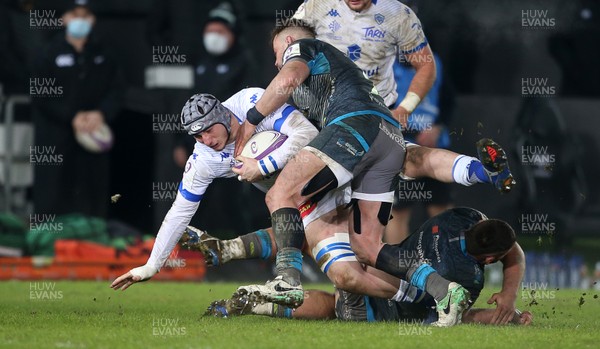 121220 - Ospreys v Castres Olympique - European Challenge Cup - Florent Vanverberghe of Castres is tackled by Gareth Thomas and Sam Parry of Ospreys