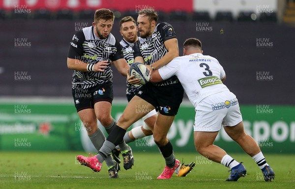 151017 - Ospreys v Clermont Auvergne - European Rugby Champions Cup - Cory Allen of Ospreys is tackled by Rabah Slimani of Clermont