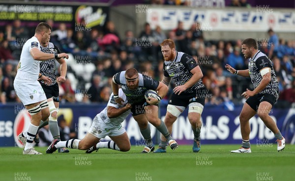 151017 - Ospreys v Clermont Auvergne - European Rugby Champions Cup - Dmitri Arhip of Ospreys is tackled by Raphael Chaume of Clermont
